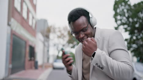 Business,-city-and-black-man-with-headphones