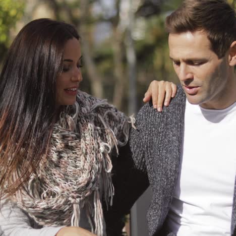 happy young couple enjoying the autumn sunshine