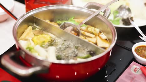 delicious hotpot meal being prepared and enjoyed