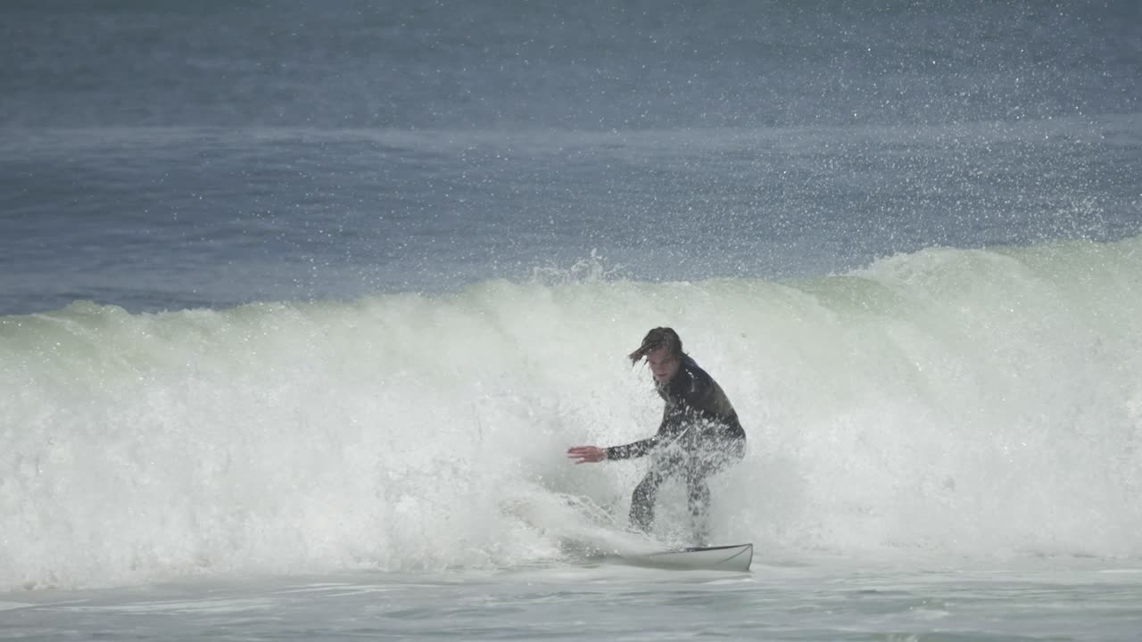 Explosive top turn right on the lip, throwing spray and full commitment. A radical move showcasing timing