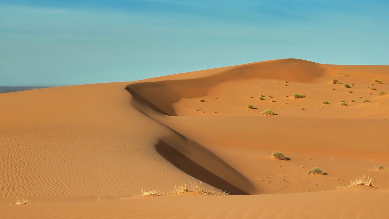 Dramatic Golden Sand Dunes Under Sky, Sharp Crescent Crest With Rippled Texture And Scattered Shrubs, Strong