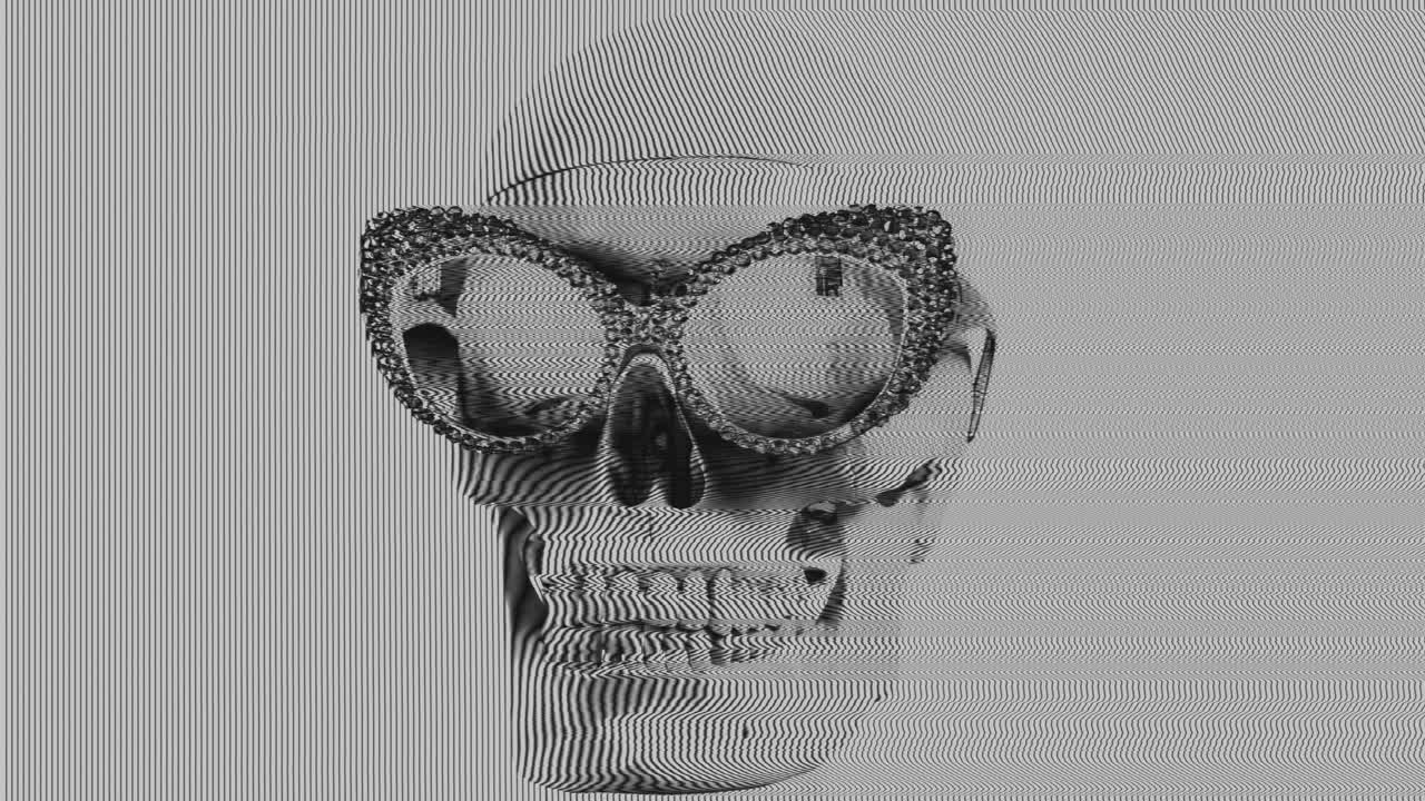 cranio umano con occhiali da sole