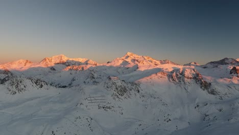 sunset over le mont blanc in the french alps by drone.