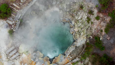 Aerial-drone-shot-of-Furnas-volcanic-natural-geothermal-hot-springs-in-Sao-Miguel-in-the-Azores-Islands,-Atlantic-Ocean---Portugal