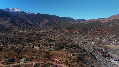 aerial drone footage over western colorado springs, with a view of the mountains, in colorado