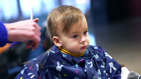 baby getting a haircut