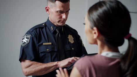 police officer interviewing a citizen