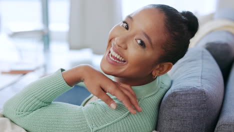 Portrait-of-a-cheerful-black-woman-relaxing