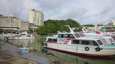 toba marina in mie prefecture, panning over resort hotels and boats