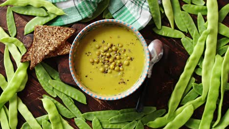 Green-pea-cream-soup-in-grey-bowl