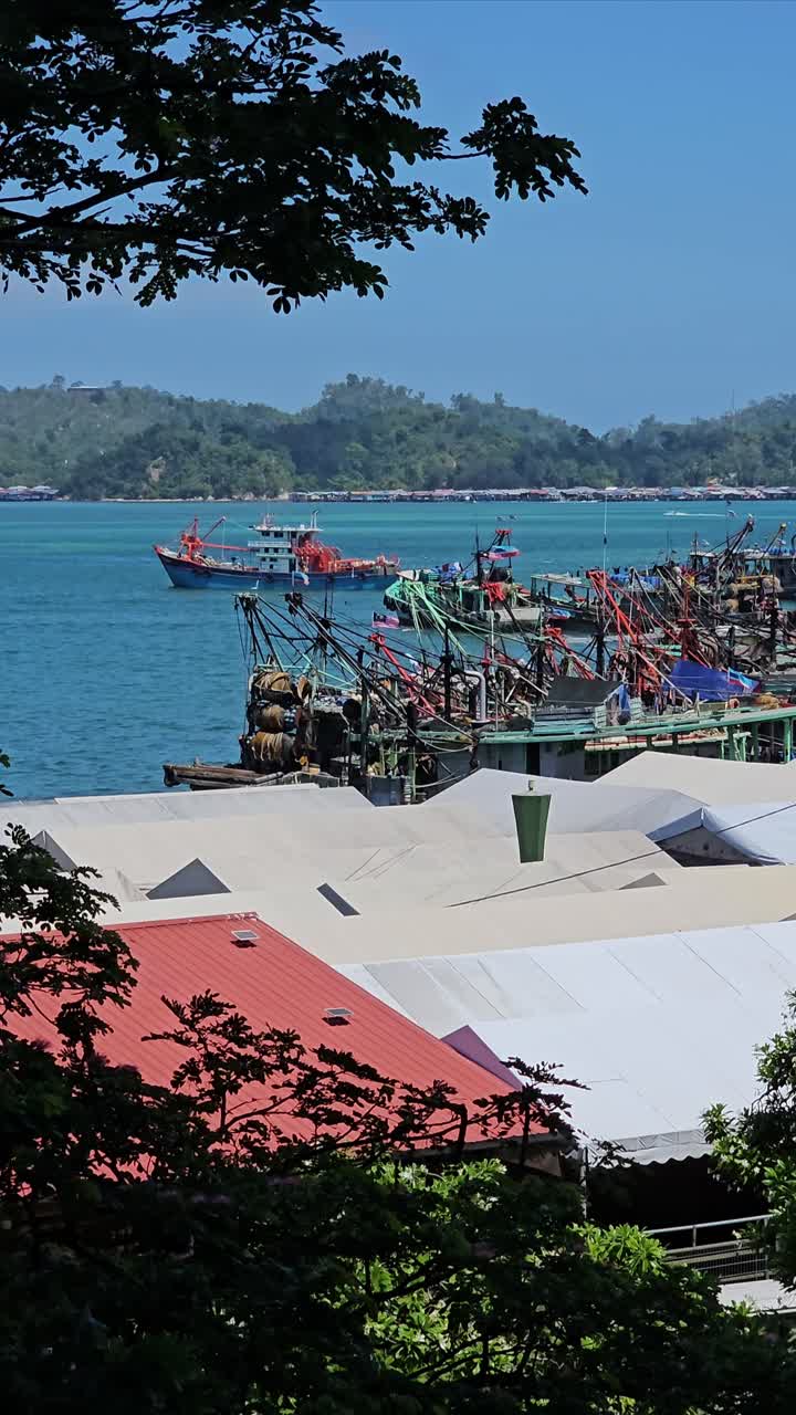 Vertical - Fishing Boats Docked At Fisheries Complex In Kota Kinabalu, Sabah, Malaysia. high angle, static shot