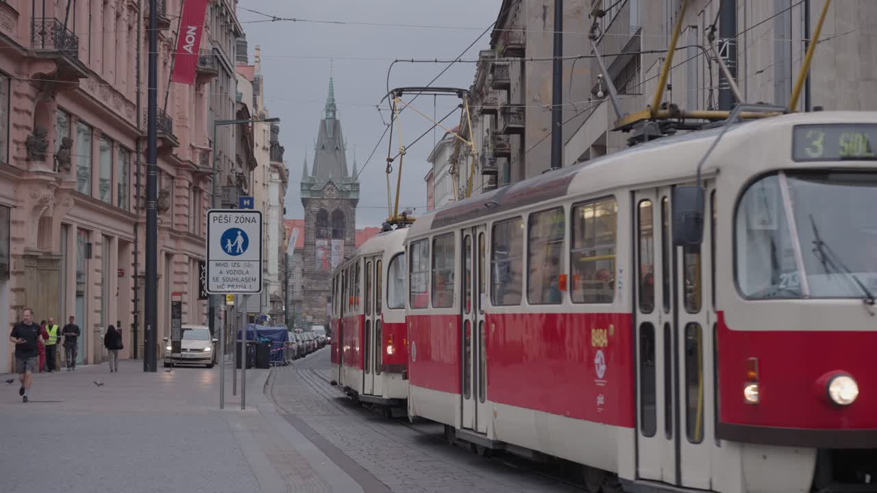 A Prague Street Scene with a Tram