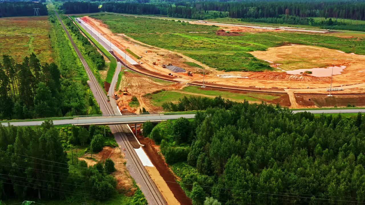 Drone video of major road and infrastructure works with cleared land and new installations