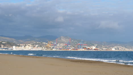 malaga seen from beach on sunny day. static