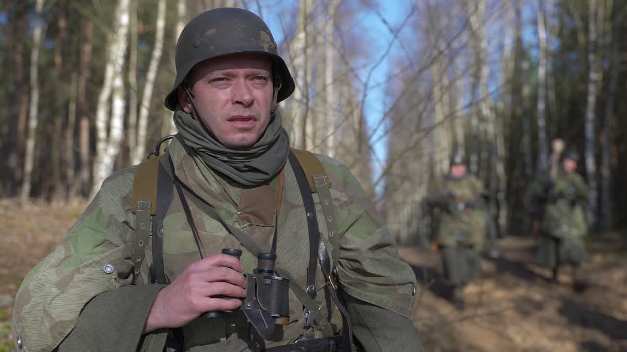 German Soldier Observing in the Forest