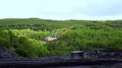 coal mine landscape with heavy machinery