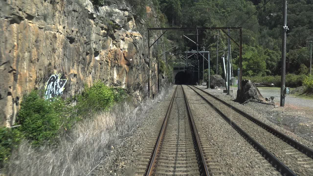 train drivers view going into tunnel