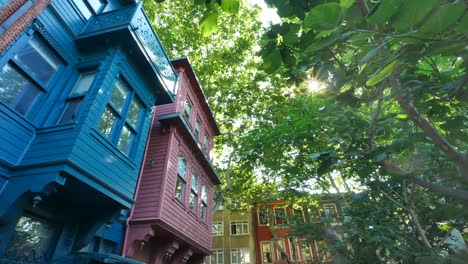 colorful historic buildings in a lush urban garden