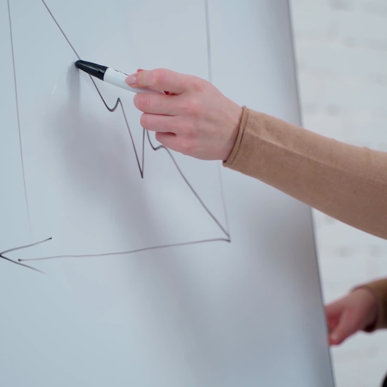 Businesswoman working with board