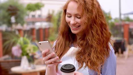 barista using a mobile phone during a short break