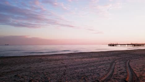 walking out on a beach during sunrise