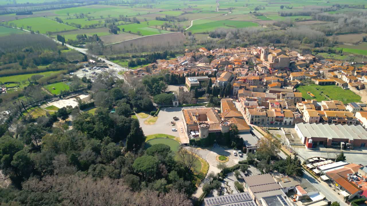 Peralada aerial view of peralada, a charming medieval village and castle in catalonia, spain, showing the surrounding landscape and architecture