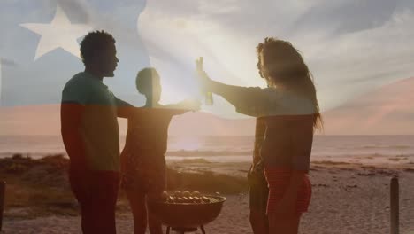 animation of waving flag of chile over group of friends having fun on the beach