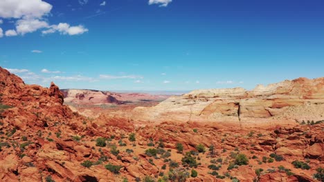 cinematic shot , aerial drone view of the rugged cliffs and desert landscape of utah near moab, usa