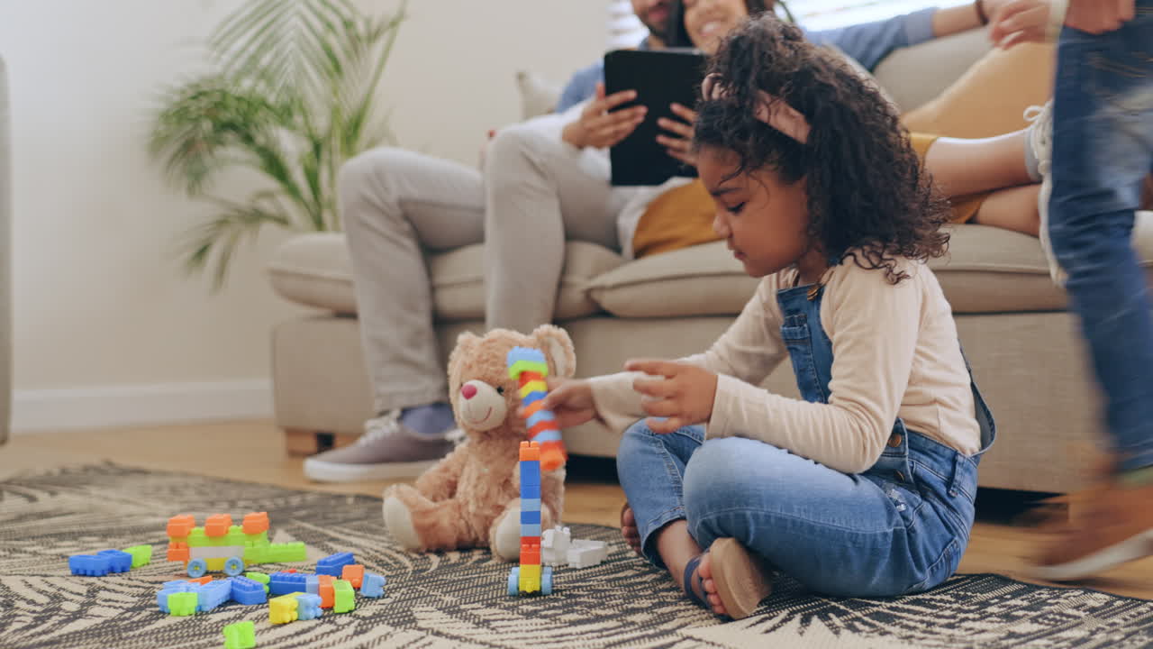 Home, parents and children on the ground