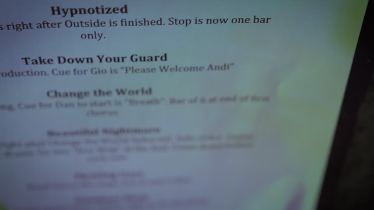 A close up of a concert set list.