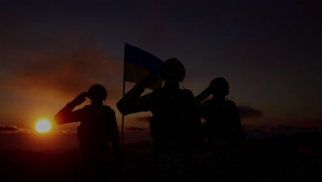 silhouette of a soldier with the ukraine flag stands against the background of a sunset or sunrise. concept of national holidays. commemoration day