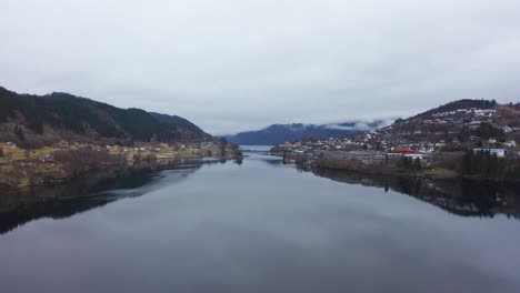 Forward-moving-aerial-Arnavaagen-sea-,-close-to-Sorfjorden,-Arna,-Bergen-and-Garnes---Arna-Bay-Norway