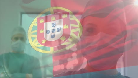 Animation-of-flag-of-portugal-waving-over-surgeons-in-operating-theatre