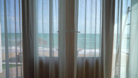 curtain-and-window-with-sea-beach-outside-view