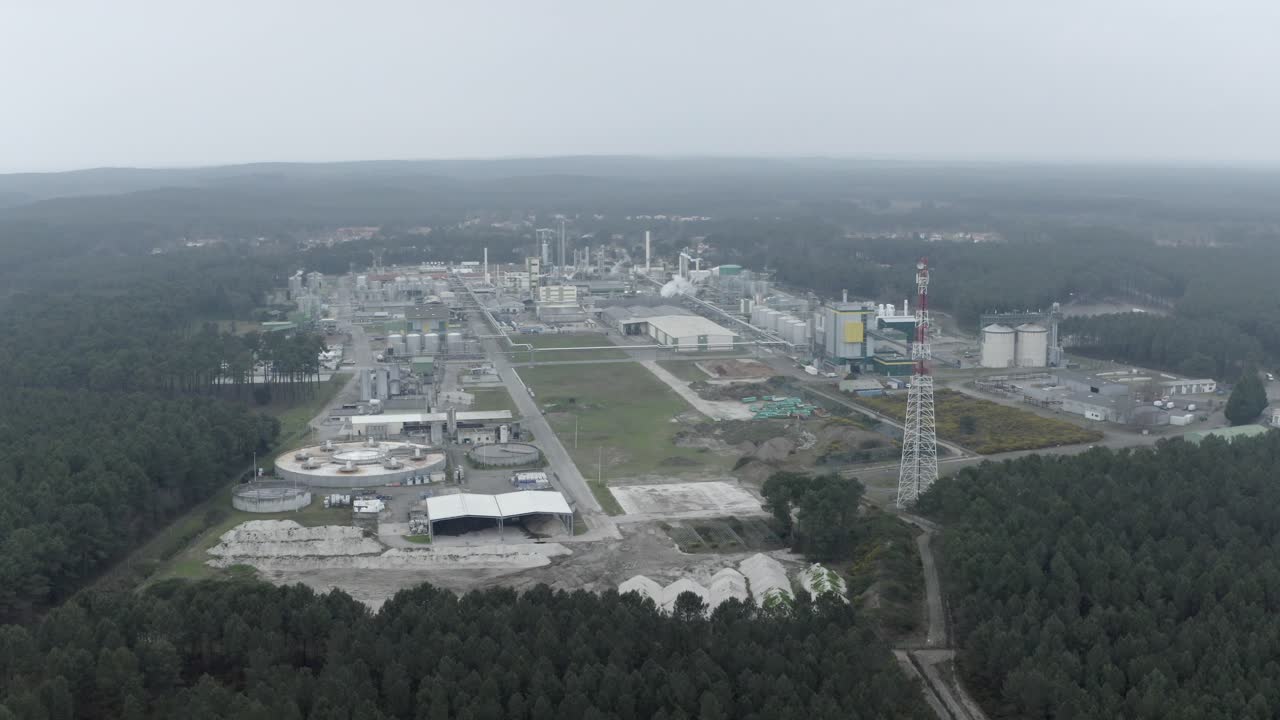 Aerial drone view of Vielle-Saint-Girons industrial plant surrounded by forest, France. Copy space