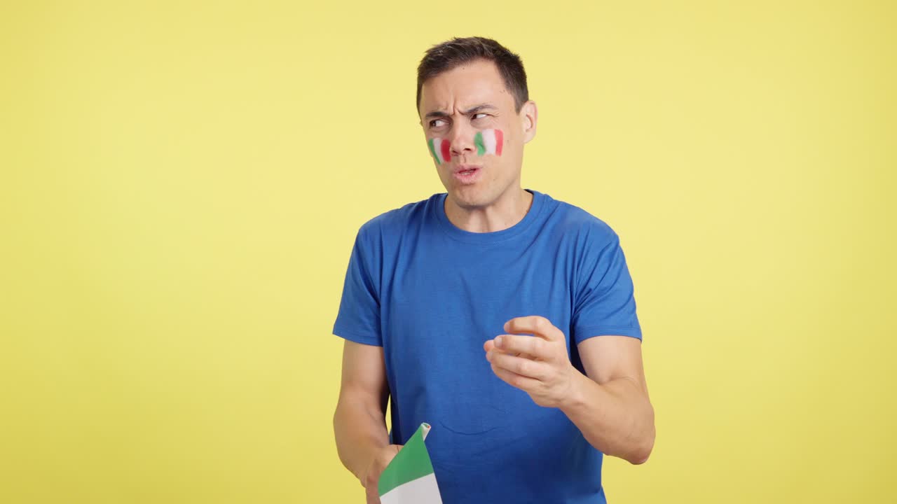 Italian supporter during an exciting march that is ultimately lost
