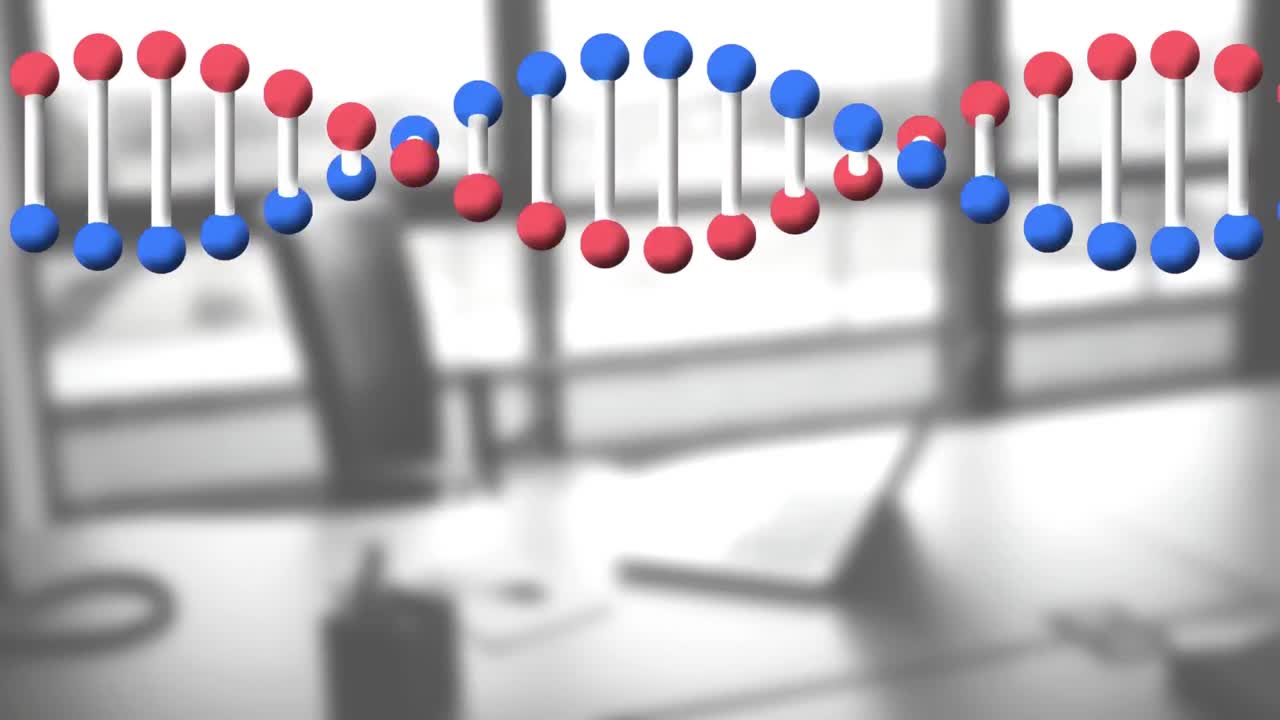 책상 위의 노트북 위에서 회전하는 dna 가닥의 애니메이션