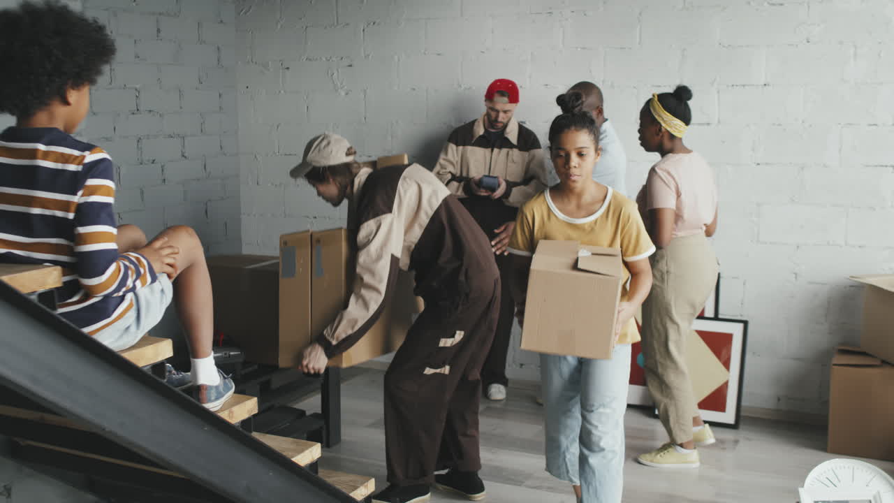 Family Moving with Delivery People