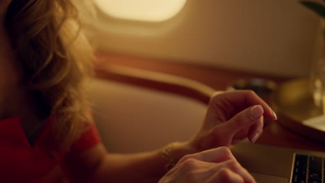 Beautiful-businesswoman-looking-laptop-screen.-Closeup-manager-hands-at-keyboard