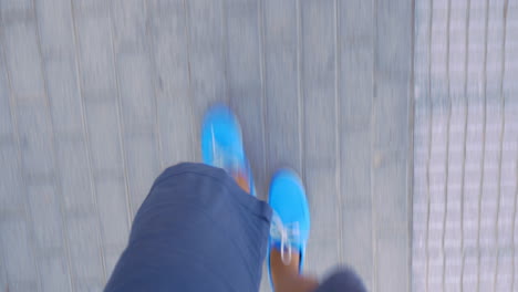 Timelapse-of-male-feet-walking-on-sidewalk