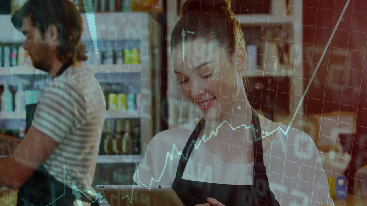 Barista che solleva un tablet, scorrendo i dati e animando grafici in crescita per monitorare le vendite al caffè.