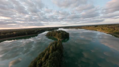 Sawinda lake in Masurian lake district Poland nature landscape FPV view