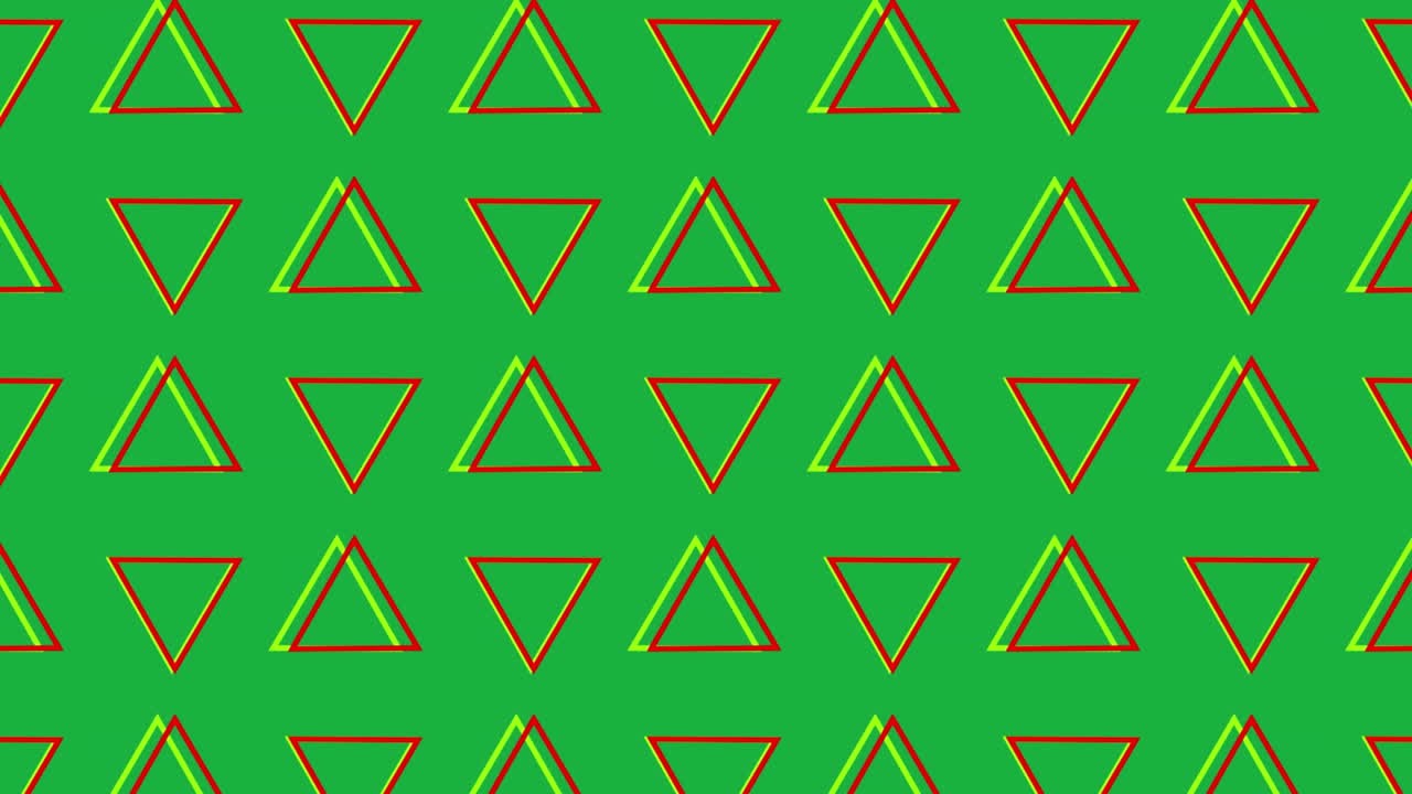 triángulos giratorios en formación sobre un fondo verde