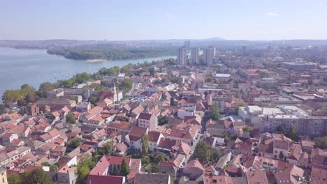 descending establishing aerial shot of old zemun city, belgrade serbia