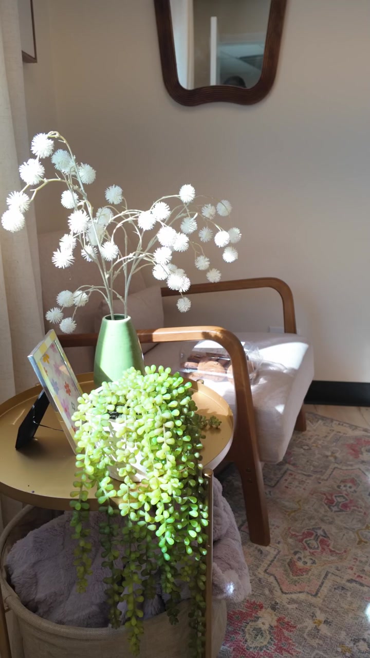 A cute morning reading nook surrounded by bright decorations and sunlight splashing into the room.