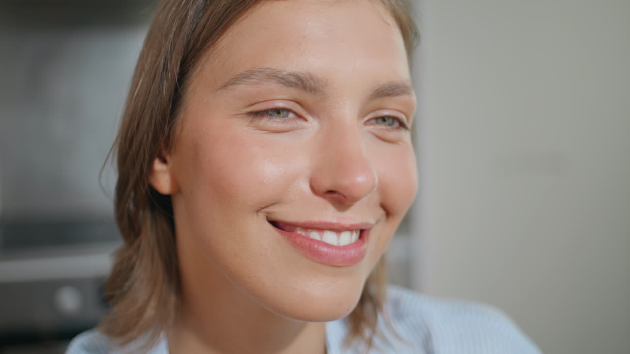 Portrait casual woman looking partner in sunlight. Smiling carefree girl talking