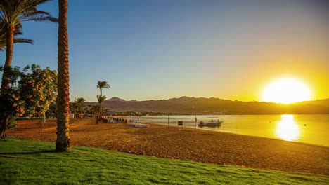 Magical-sunrise-over-exotic-tropical-beach,-time-lapse-view