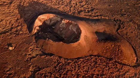 breathtaking aerial drone footage of volcano del cuervo at sunset in lanzarote, canary islands, spain.