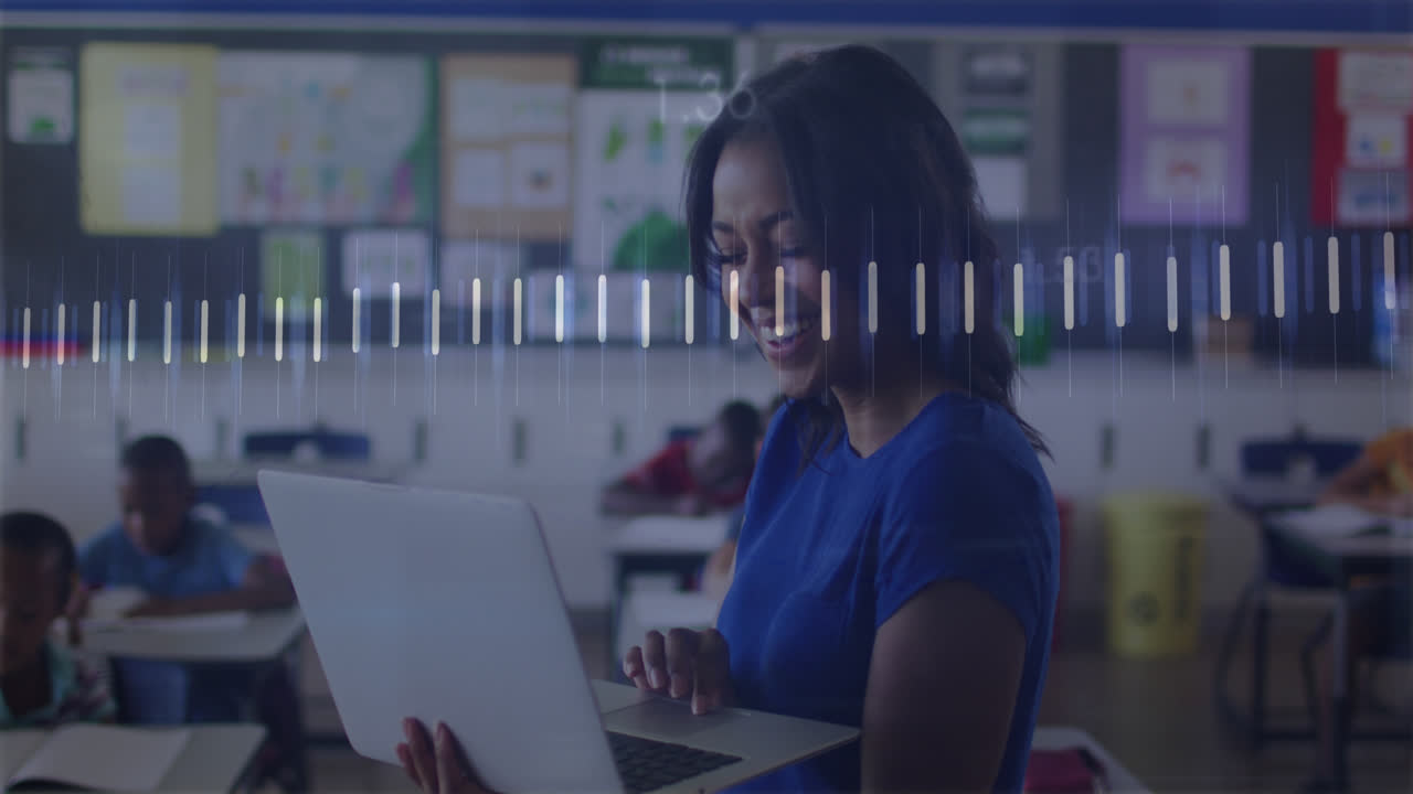 Animation of financial data processing over biracial female teacher using laptop