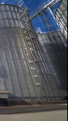 grain elevator for storing wheat and other cereal grains. agricultural silos. vertical video